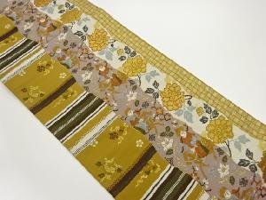 抽象人物に花唐草・横縞模様織出し袋帯